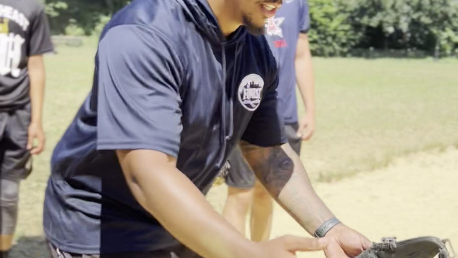 360 Instructor teaching proper fielding techniques